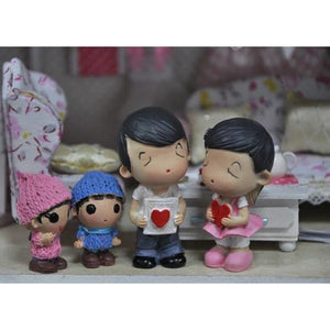 Family Of Four Resin Figures